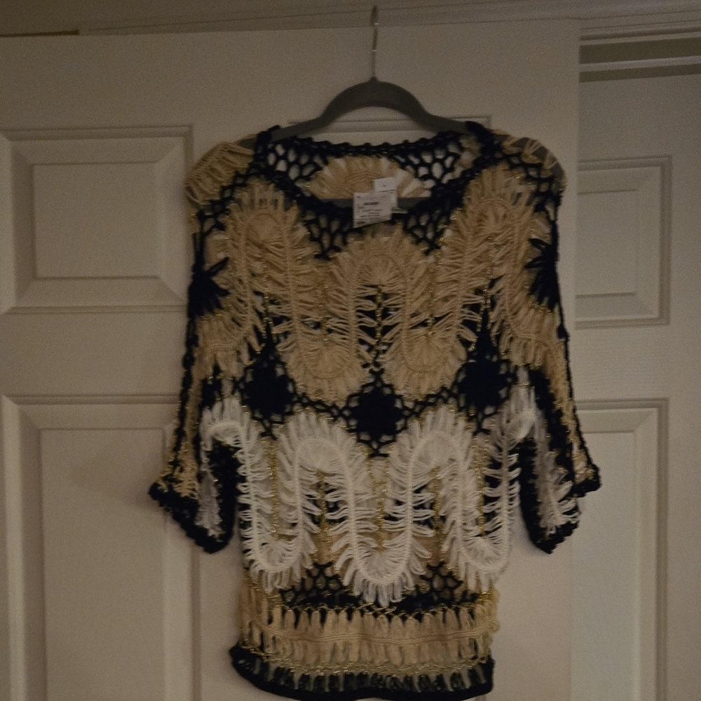 Elegant Black and Cream Crochet Sweater
